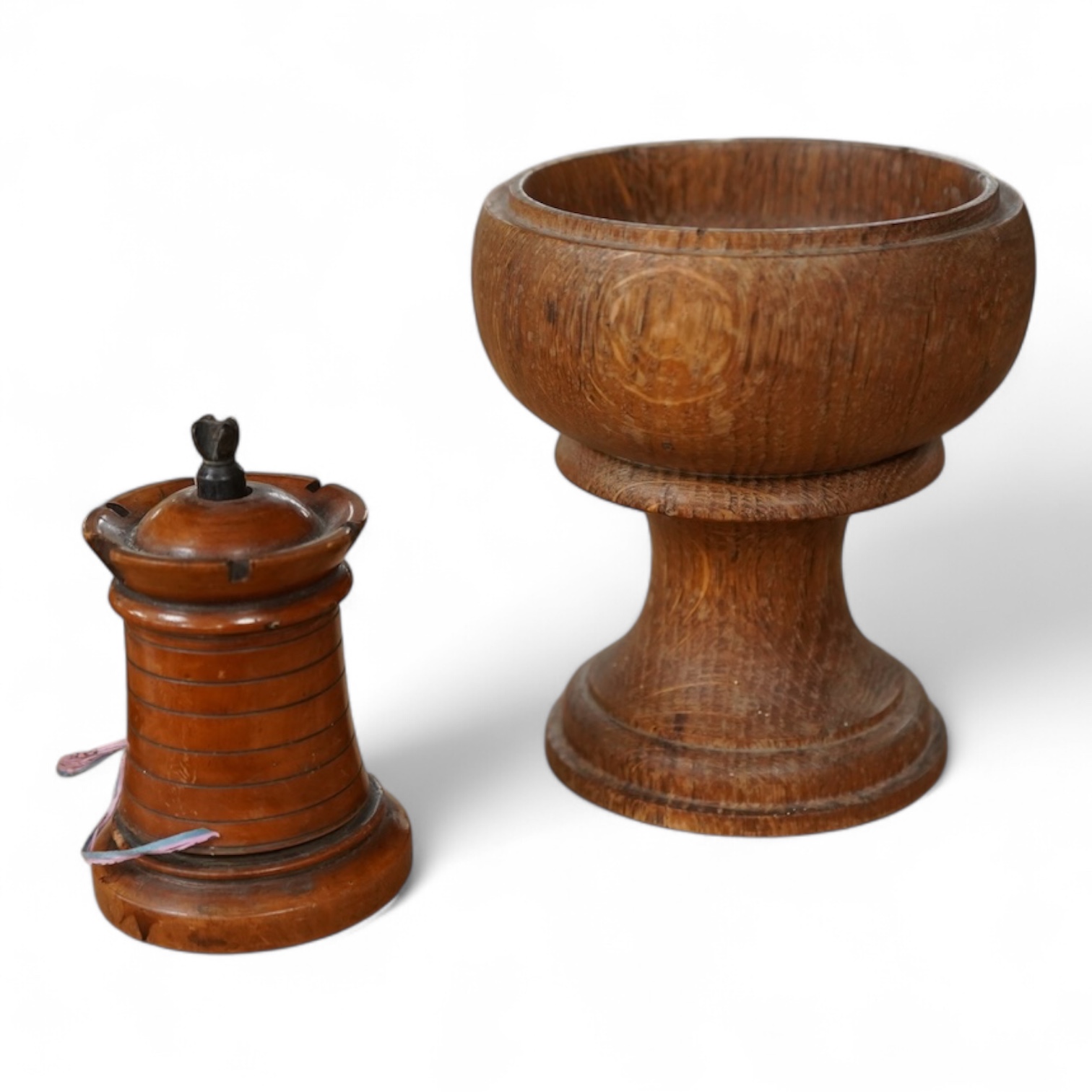 A 19th century treen tower tape measure and an oak goblet with provence label, 13cm